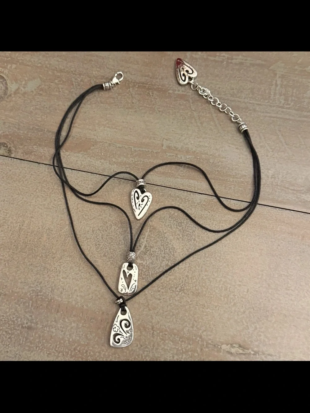 Brighton Brazilian Black multi charm triple strand leather cord necklace